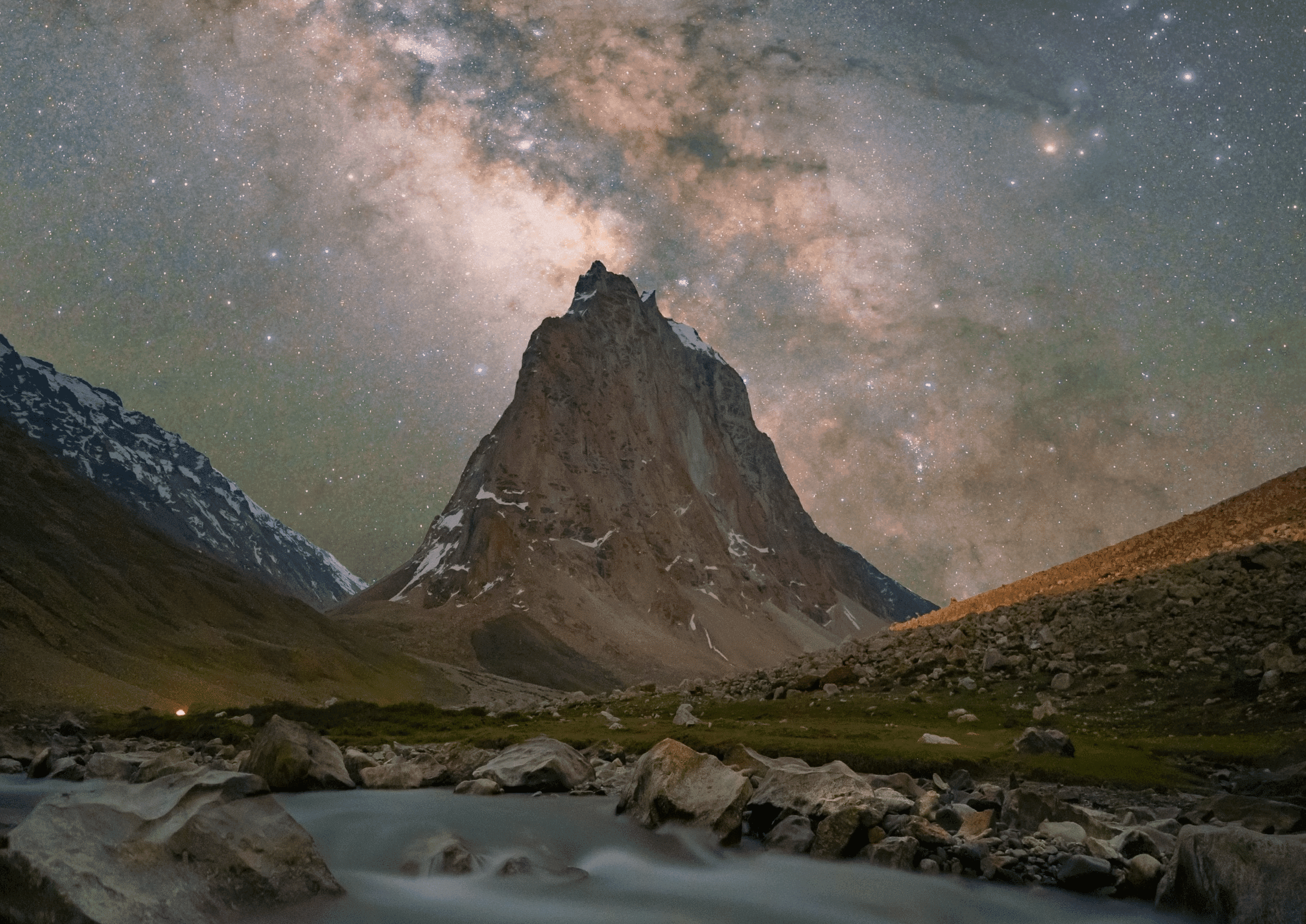 Riders crossing the challenging mountain terrain